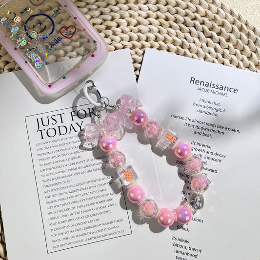 New acrylic bow bead string mobile phone chain keychain pendant DIY bag accessories fashionable and simple style