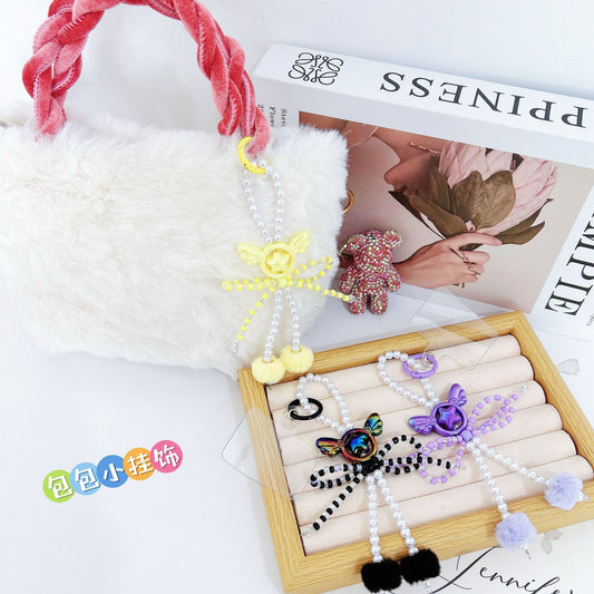 Angel wings beads string mobile phone chain creative bow hairball bag car keychain pendant mobile phone case universal