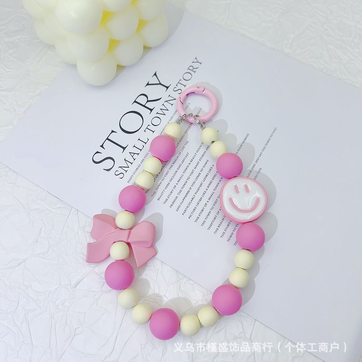 Candy-colored rubber beads smiley face mobile phone pendant bead string keychain live broadcast of the same hanging doll luggage accessories anti-lost