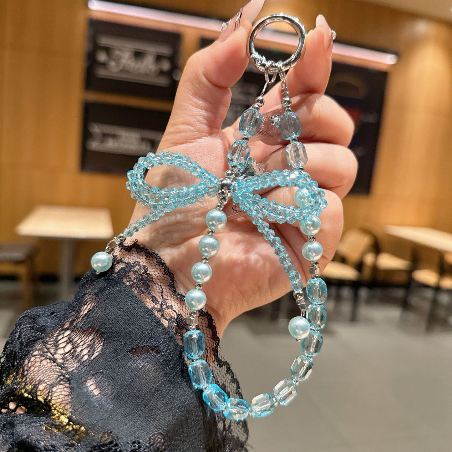 Internet celebrity high sense three-dimensional crystal bow mobile phone chain pendant key lanyard pearl mobile phone lanyard bag chain