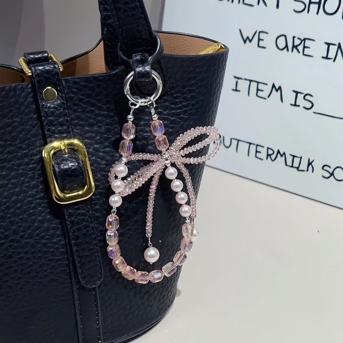 Internet celebrity high sense three-dimensional crystal bow mobile phone chain pendant key lanyard pearl mobile phone lanyard bag chain