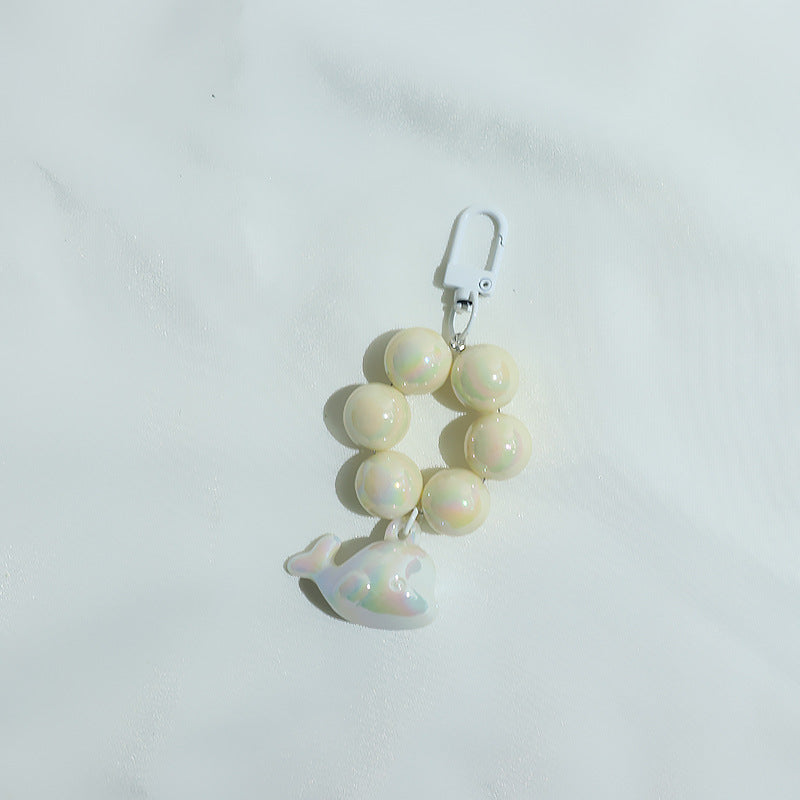 New electroplated cute three-dimensional little dolphin beaded mobile phone chain pendant key pendant luggage accessories student schoolbag