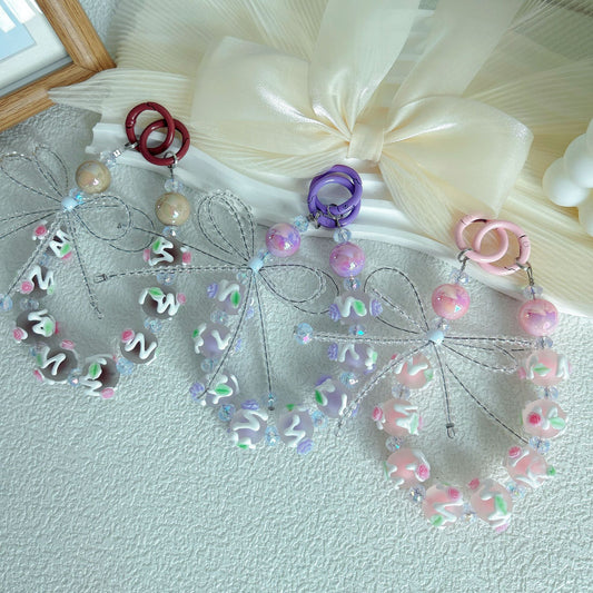Creative beaded crystal bow hand-painted bead mobile phone chain keychain blind box live broadcast the same claw machine gift