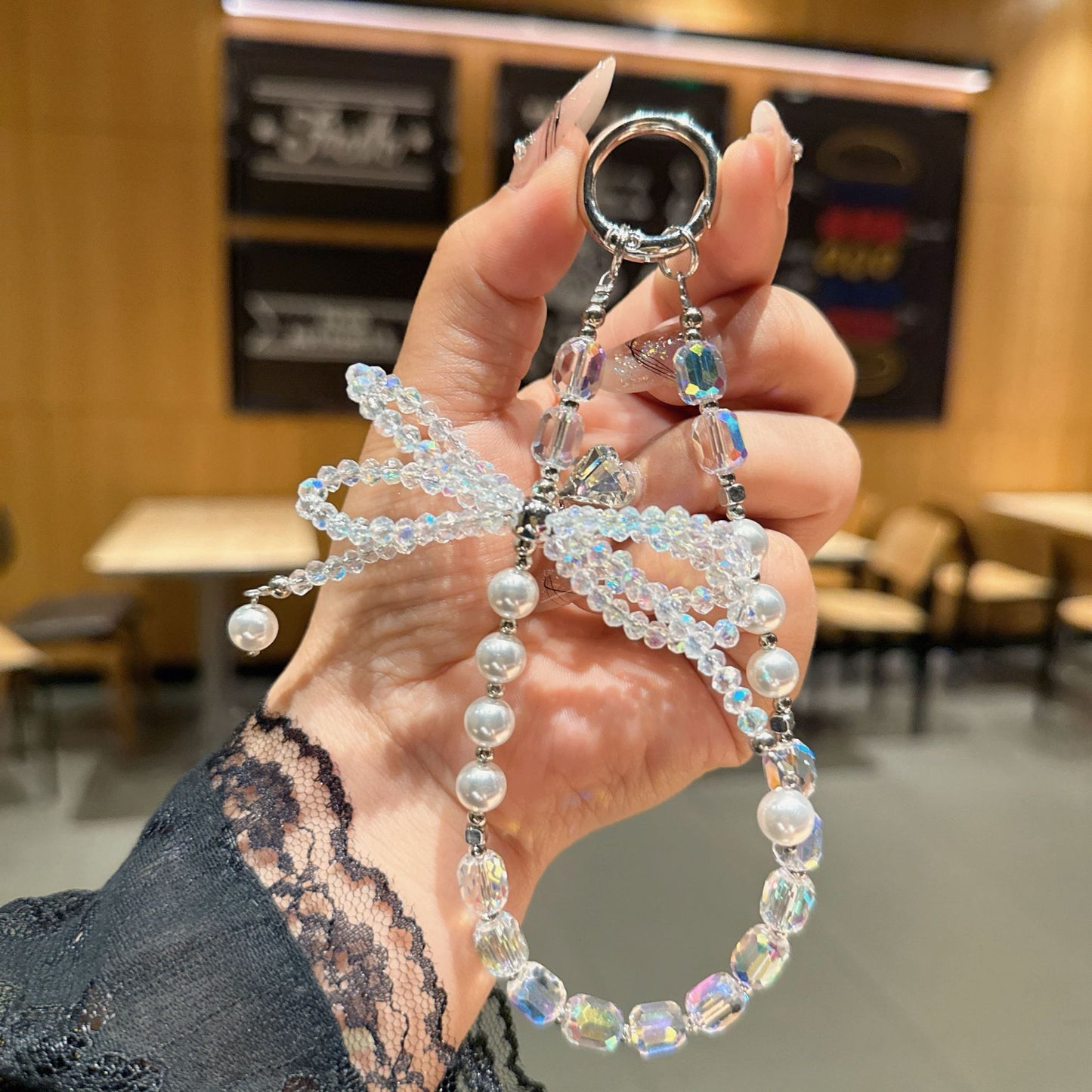 Internet celebrity high sense three-dimensional crystal bow mobile phone chain pendant key lanyard pearl mobile phone lanyard bag chain