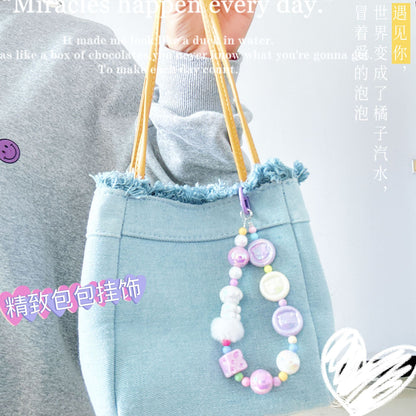 Autumn and winter new pig calcium tablets mobile phone chain colored rice bead string pendant car keychain earphone bag accessories