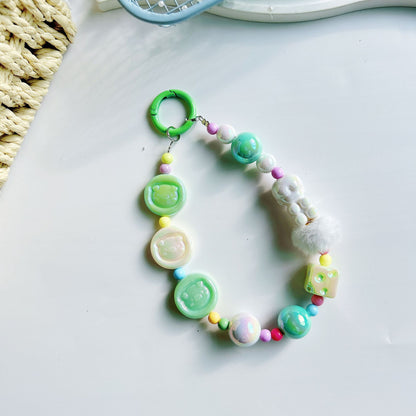 Autumn and winter new pig calcium tablets mobile phone chain colored rice bead string pendant car keychain earphone bag accessories
