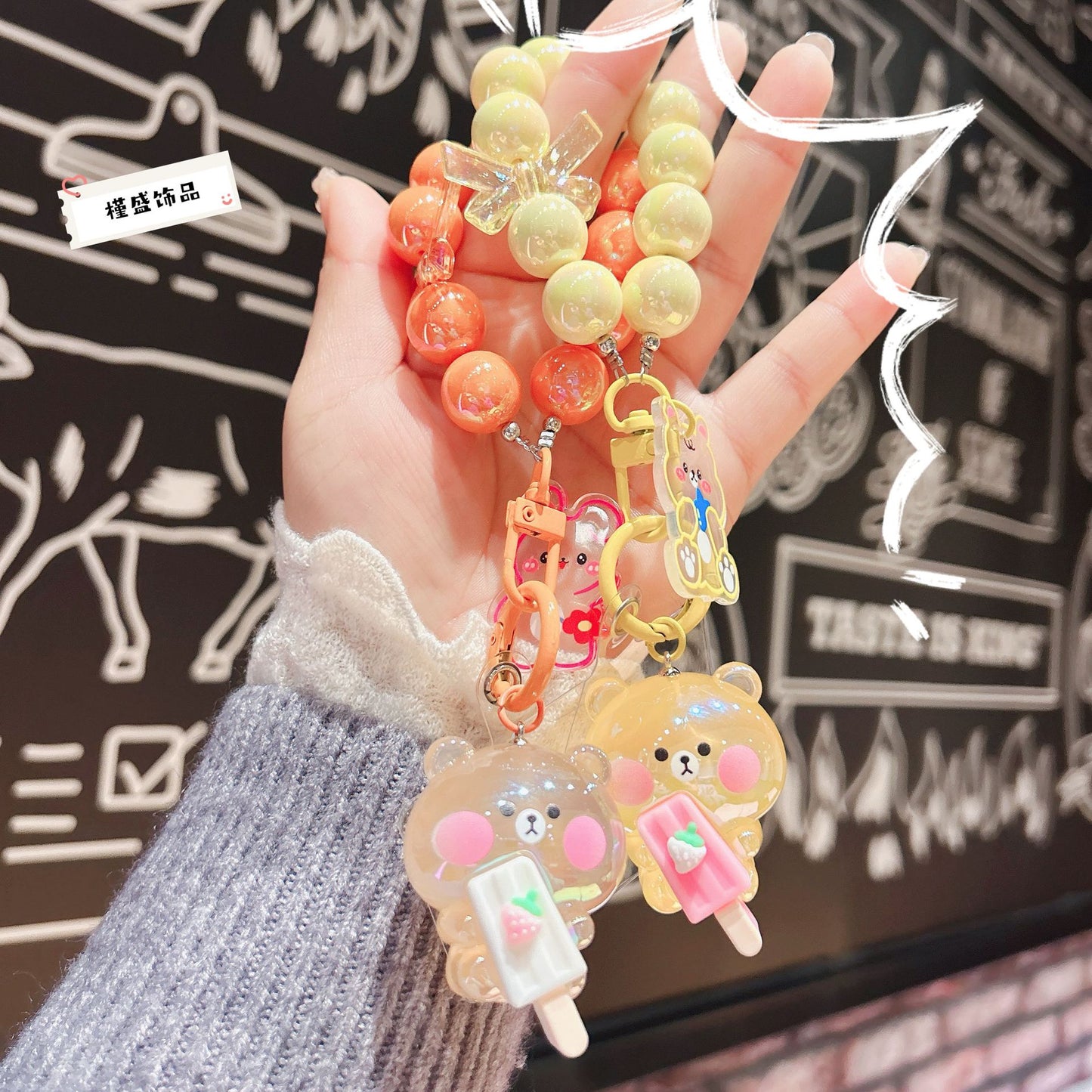 Cartoon luminous acrylic popsicle bear keychain cute mobile phone chain pendant doll bead string bag pendant gift