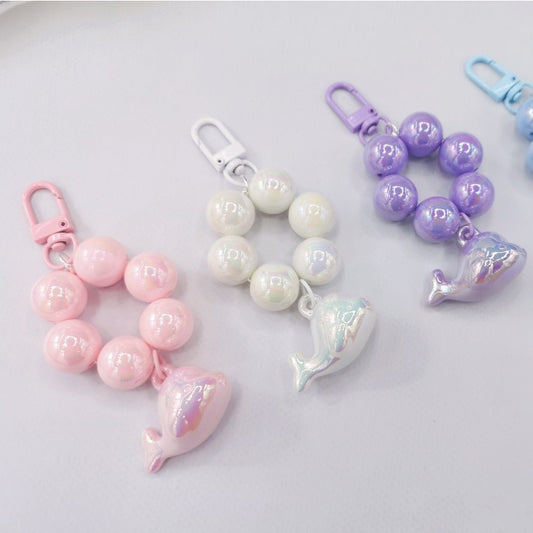 New electroplated cute three-dimensional little dolphin beaded mobile phone chain pendant key pendant luggage accessories student schoolbag