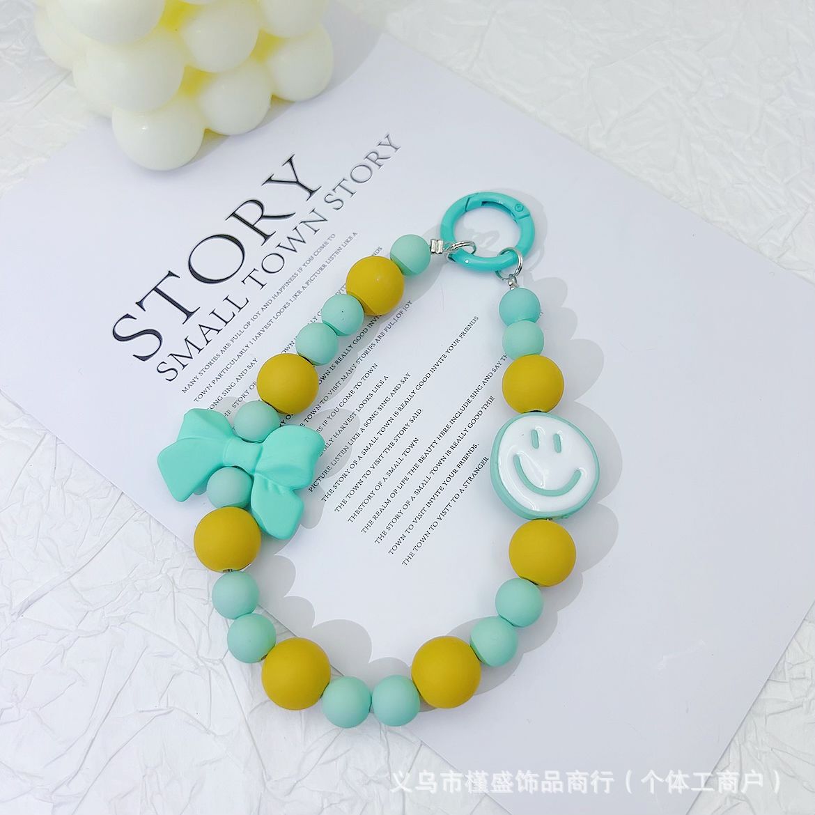 Candy-colored rubber beads smiley face mobile phone pendant bead string keychain live broadcast of the same hanging doll luggage accessories anti-lost