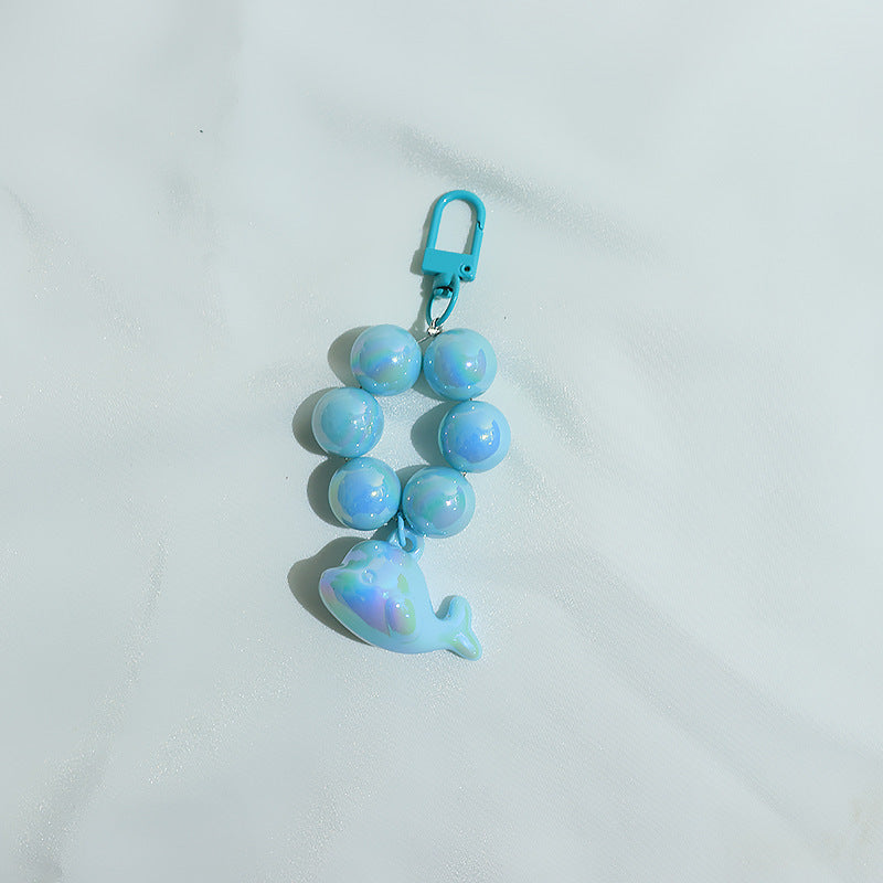 New electroplated cute three-dimensional little dolphin beaded mobile phone chain pendant key pendant luggage accessories student schoolbag