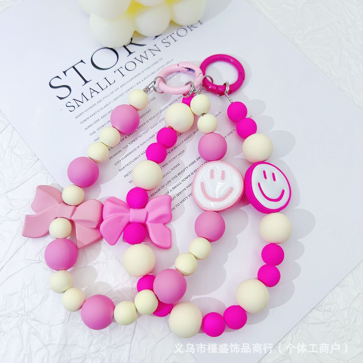 Candy-colored rubber beads smiley face mobile phone pendant bead string keychain live broadcast of the same hanging doll luggage accessories anti-lost