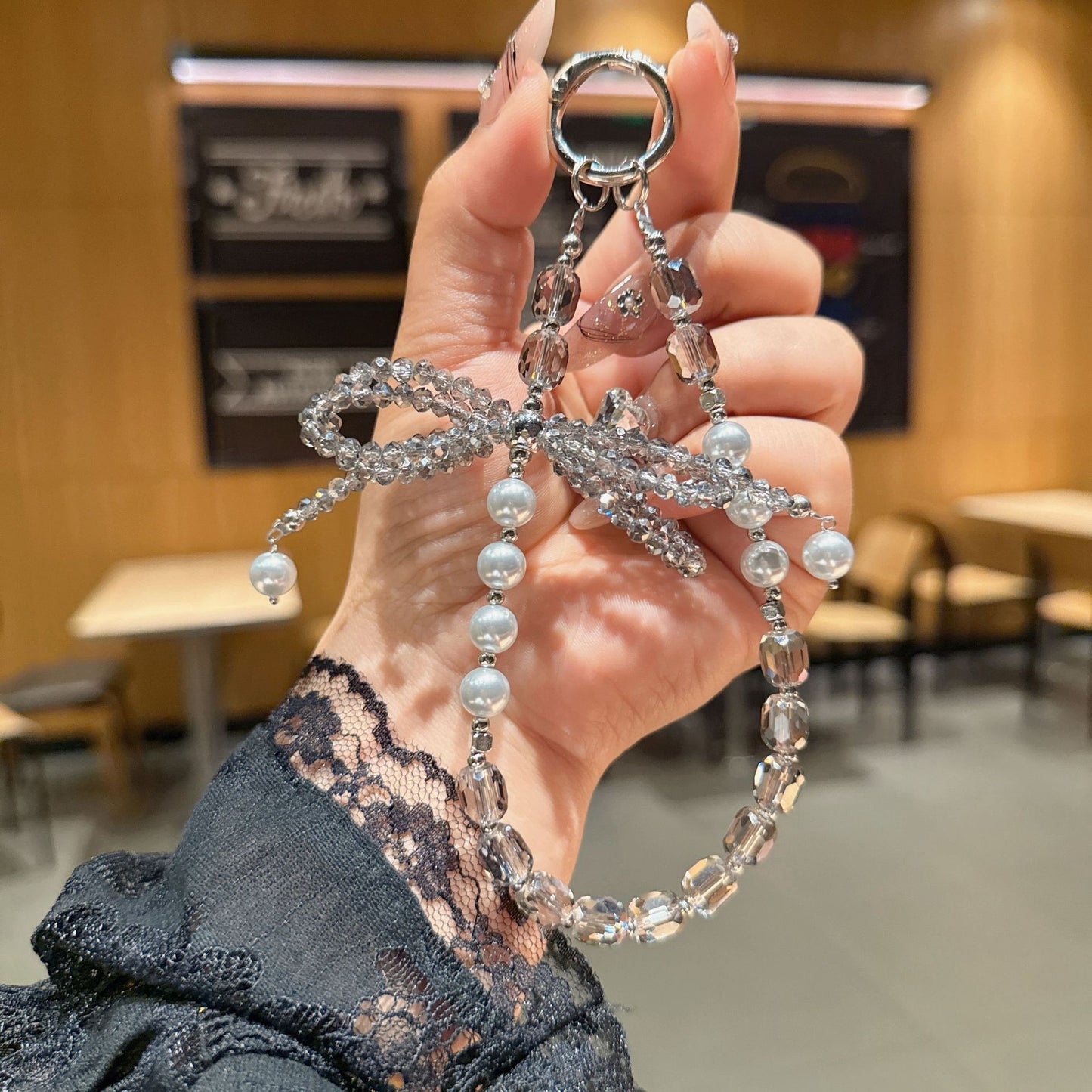 Internet celebrity high sense three-dimensional crystal bow mobile phone chain pendant key lanyard pearl mobile phone lanyard bag chain