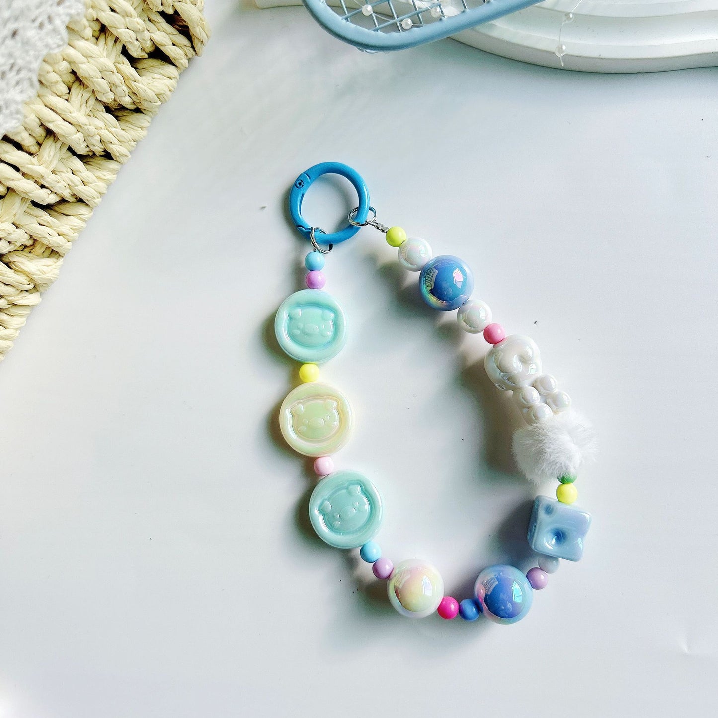 Autumn and winter new pig calcium tablets mobile phone chain colored rice bead string pendant car keychain earphone bag accessories