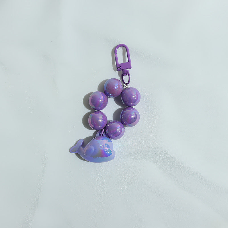 New electroplated cute three-dimensional little dolphin beaded mobile phone chain pendant key pendant luggage accessories student schoolbag