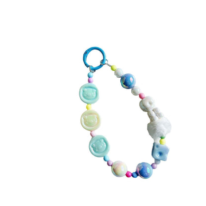 Autumn and winter new pig calcium tablets mobile phone chain colored rice bead string pendant car keychain earphone bag accessories