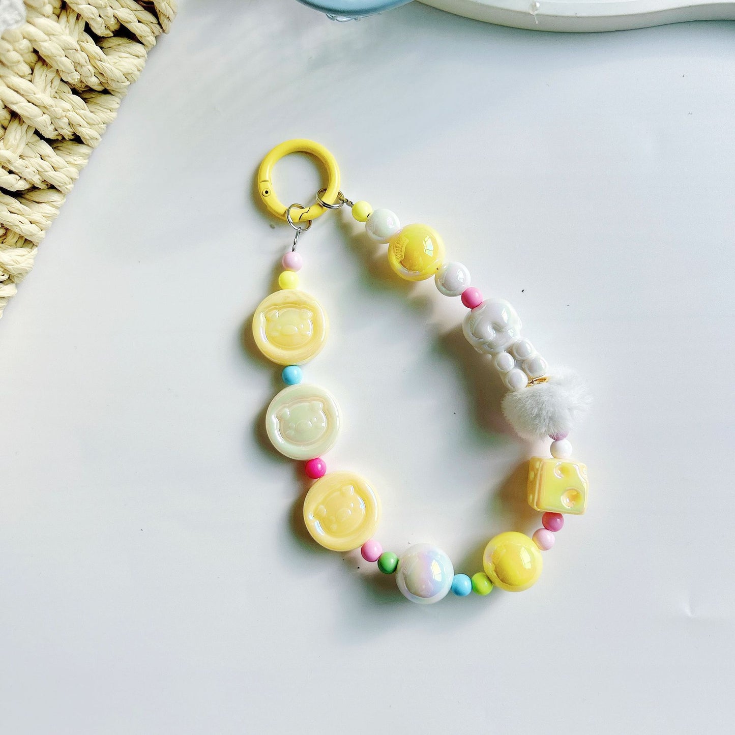 Autumn and winter new pig calcium tablets mobile phone chain colored rice bead string pendant car keychain earphone bag accessories