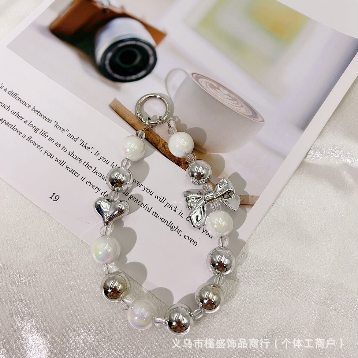 Silver-plated bow mobile phone chain pendant Xiaohongshu same temperament versatile personalized mobile phone case keychain accessories