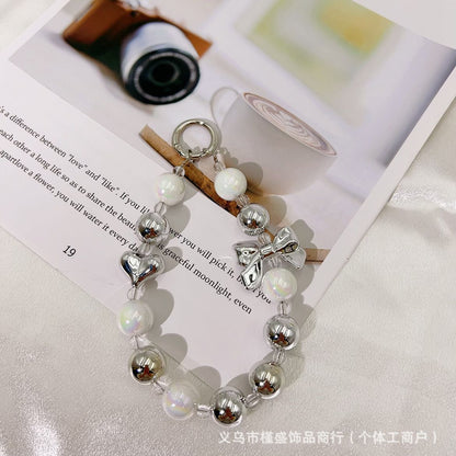 Silver-plated bow mobile phone chain pendant Xiaohongshu same temperament versatile personalized mobile phone case keychain accessories