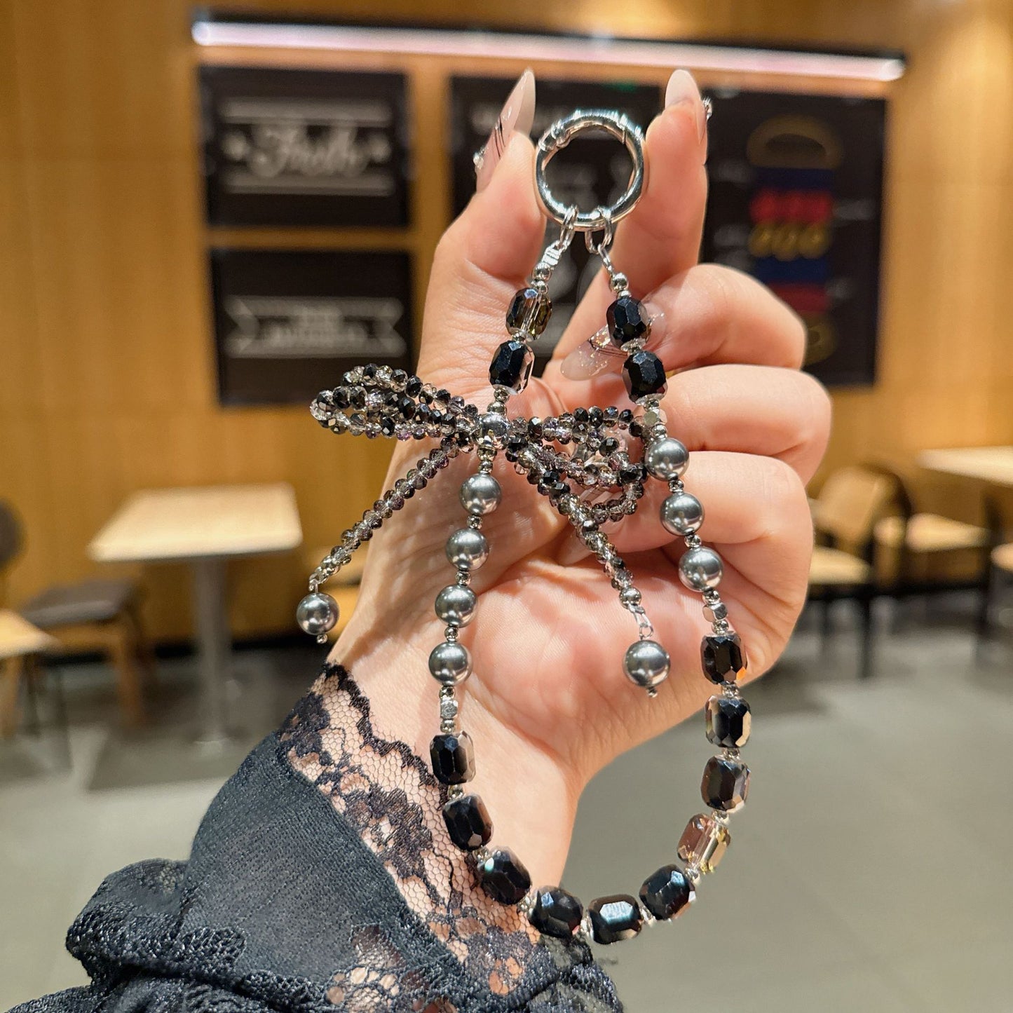 Internet celebrity high sense three-dimensional crystal bow mobile phone chain pendant key lanyard pearl mobile phone lanyard bag chain