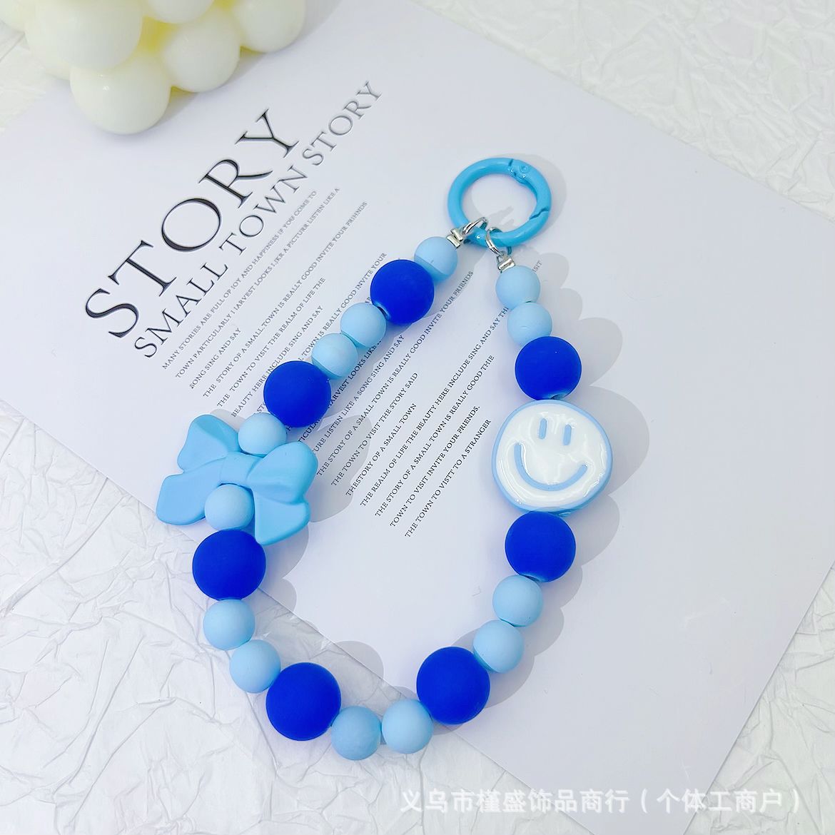 Candy-colored rubber beads smiley face mobile phone pendant bead string keychain live broadcast of the same hanging doll luggage accessories anti-lost