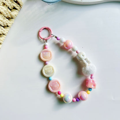 Autumn and winter new pig calcium tablets mobile phone chain colored rice bead string pendant car keychain earphone bag accessories