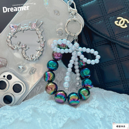 Internet celebrity pearl bow mobile phone chain girl bag exquisite pendant pink bead string wrist rope car keychain
