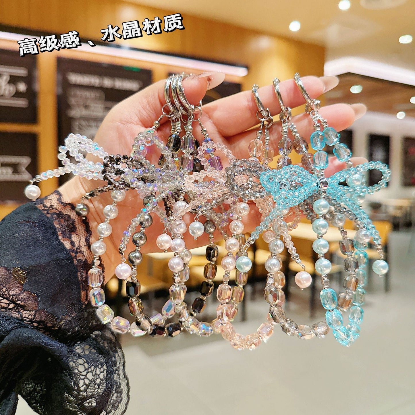 Internet celebrity high sense three-dimensional crystal bow mobile phone chain pendant key lanyard pearl mobile phone lanyard bag chain