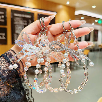 Internet celebrity high sense three-dimensional crystal bow mobile phone chain pendant key lanyard pearl mobile phone lanyard bag chain