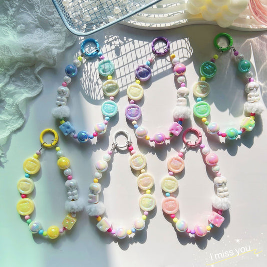 Autumn and winter new pig calcium tablets mobile phone chain colored rice bead string pendant car keychain earphone bag accessories