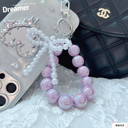 Internet celebrity pearl bow mobile phone chain girl bag exquisite pendant pink bead string wrist rope car keychain