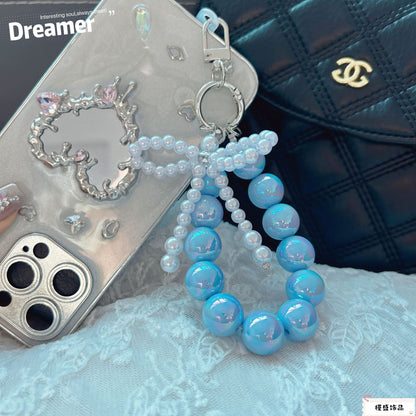 Internet celebrity pearl bow mobile phone chain girl bag exquisite pendant pink bead string wrist rope car keychain