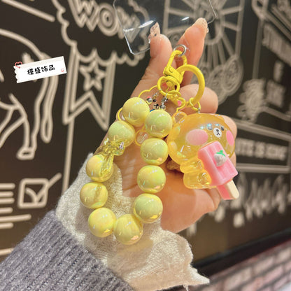 Cartoon luminous acrylic popsicle bear keychain cute mobile phone chain pendant doll bead string bag pendant gift