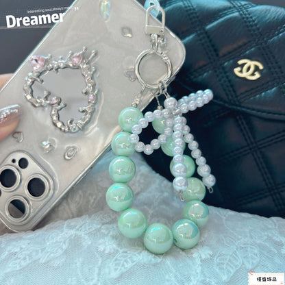 Internet celebrity pearl bow mobile phone chain girl bag exquisite pendant pink bead string wrist rope car keychain