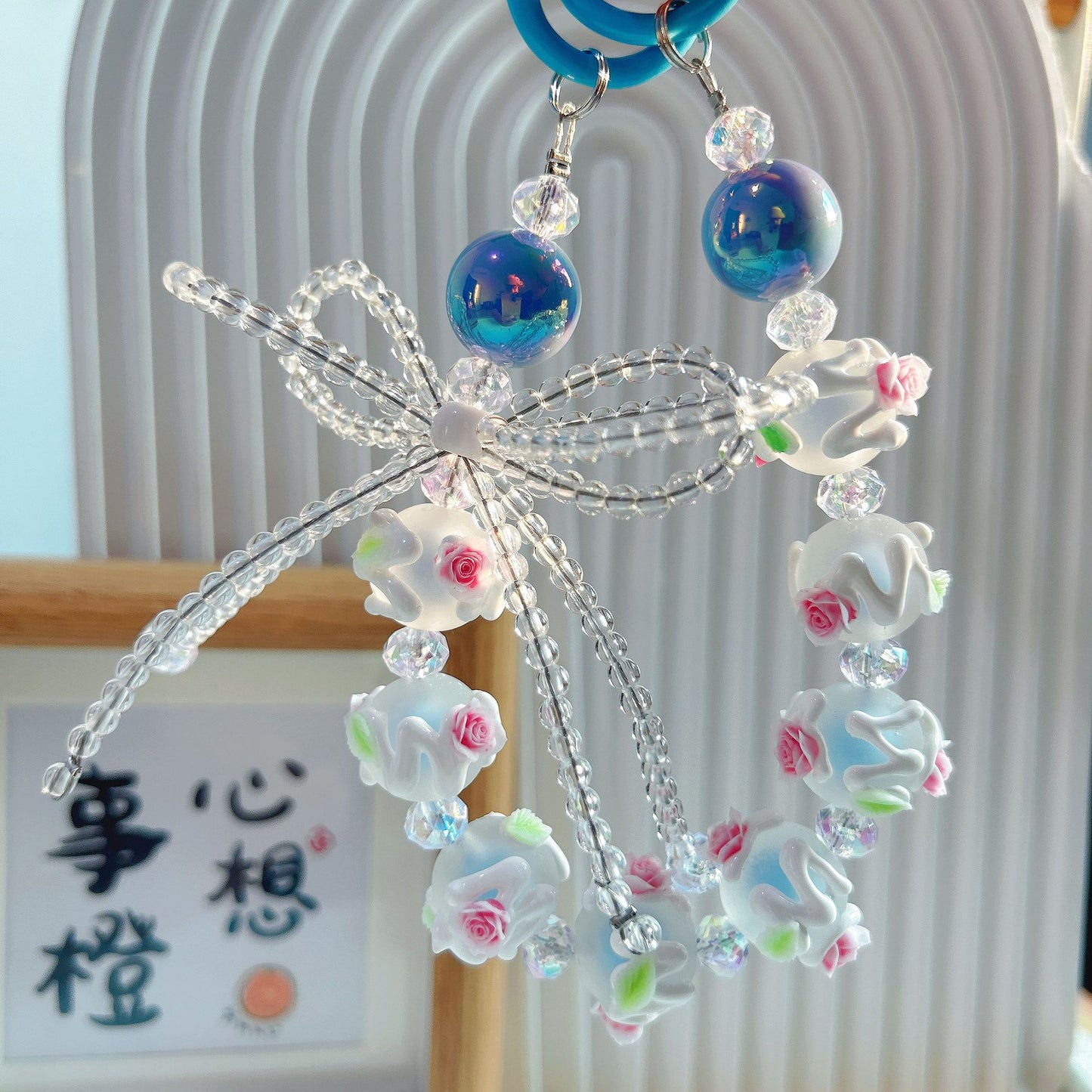 Creative beaded crystal bow hand-painted bead mobile phone chain keychain blind box live broadcast the same claw machine gift