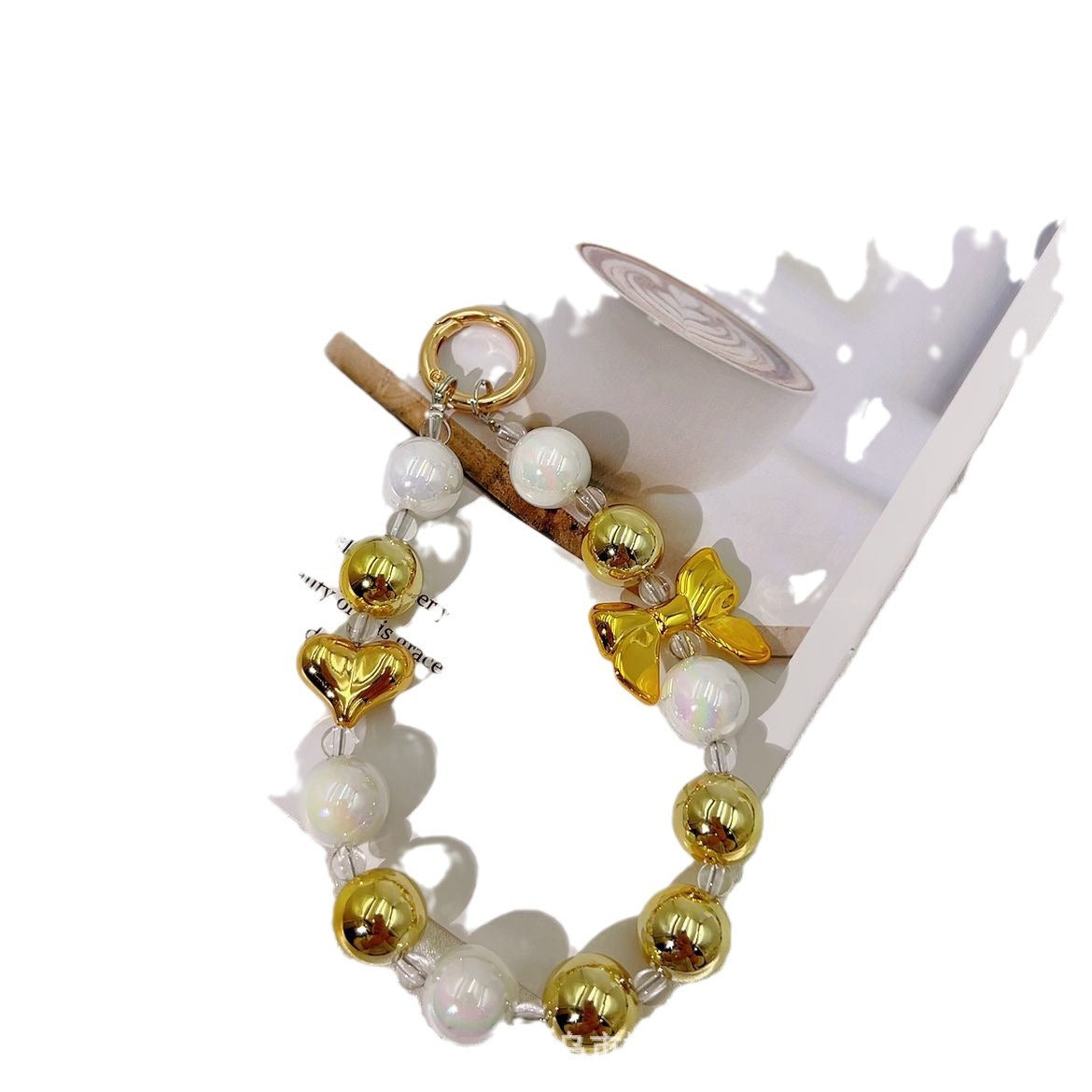 Silver-plated bow mobile phone chain pendant Xiaohongshu same temperament versatile personalized mobile phone case keychain accessories