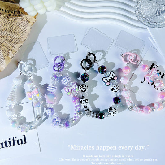 New crystal mobile phone chain pendant graffiti hand-painted bow bead string chain double buckle mobile phone case autumn and winter mobile phone chain