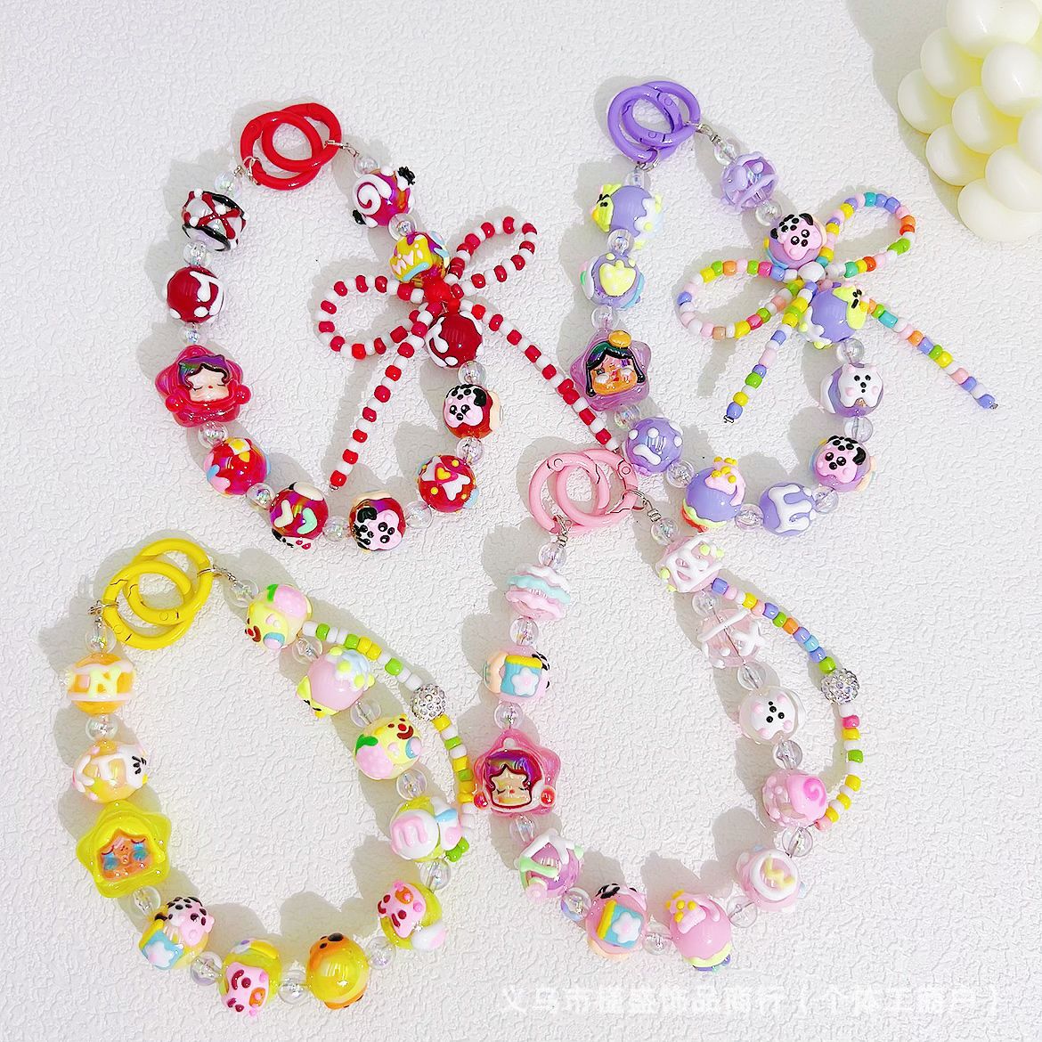 Bow hand-painted beads mobile phone chain blind box same bead string chain bag car keychain pendant clothing accessories