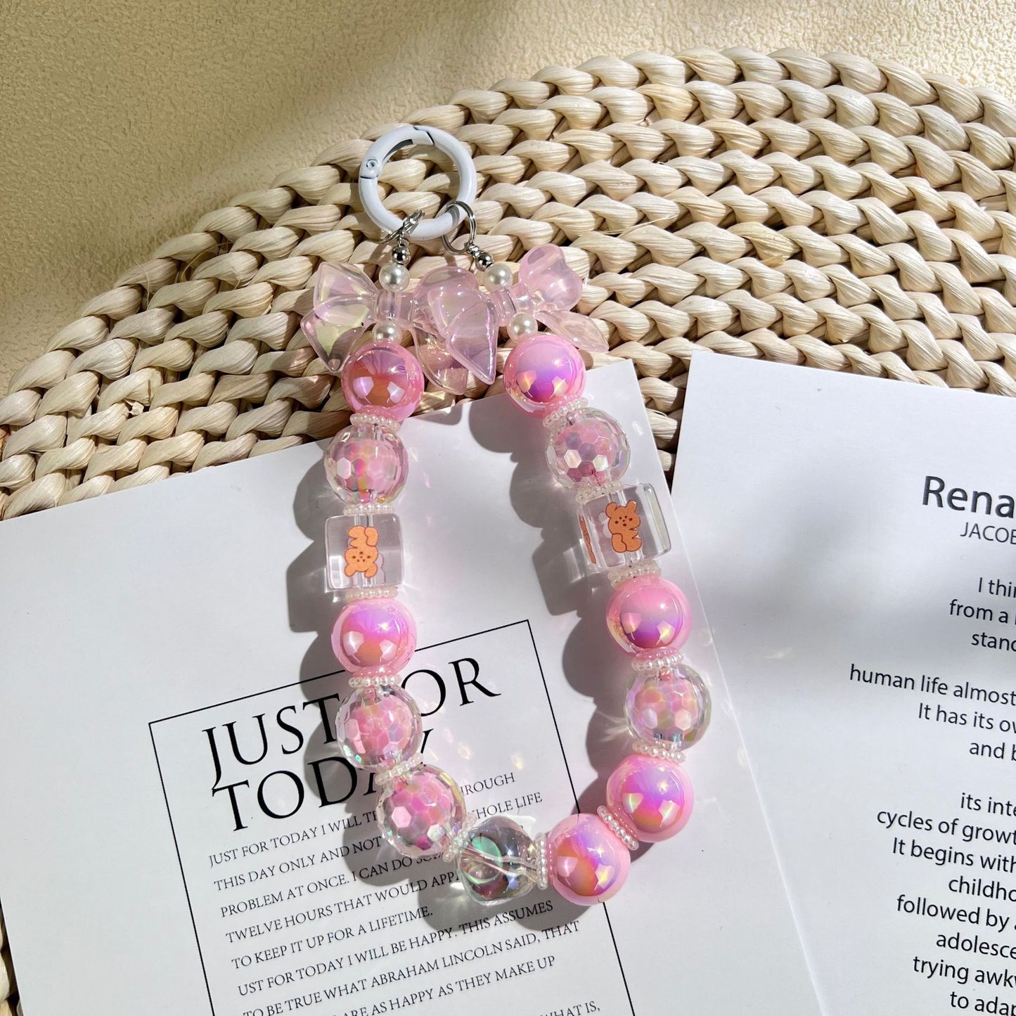 New acrylic bow bead string mobile phone chain keychain pendant DIY bag accessories fashionable and simple style