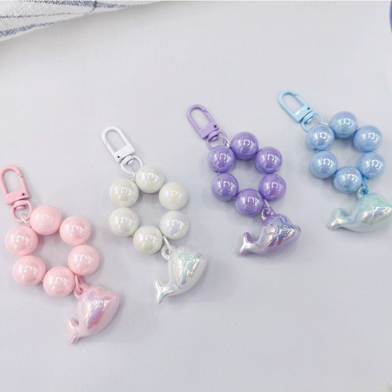 New electroplated cute three-dimensional little dolphin beaded mobile phone chain pendant key pendant luggage accessories student schoolbag