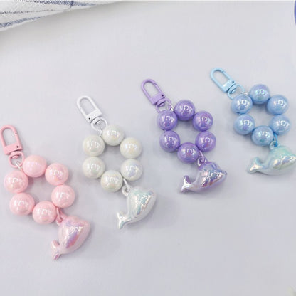 New electroplated cute three-dimensional little dolphin beaded mobile phone chain pendant key pendant luggage accessories student schoolbag