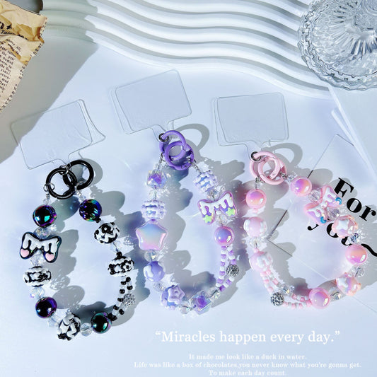 New crystal mobile phone chain pendant graffiti hand-painted bow bead string chain double buckle mobile phone case autumn and winter mobile phone chain