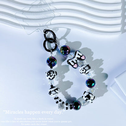 New crystal mobile phone chain pendant graffiti hand-painted bow bead string chain double buckle mobile phone case autumn and winter mobile phone chain