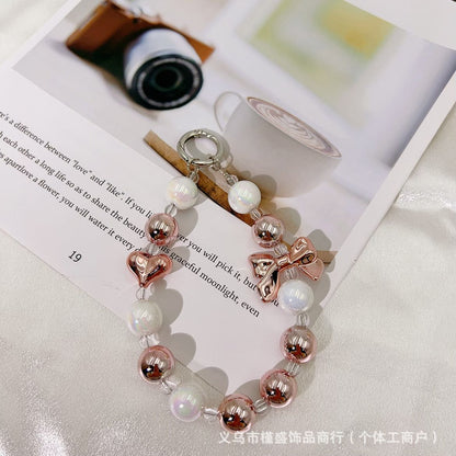 Silver-plated bow mobile phone chain pendant Xiaohongshu same temperament versatile personalized mobile phone case keychain accessories